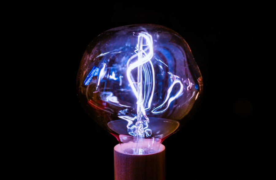 a light bulb spreading blue light