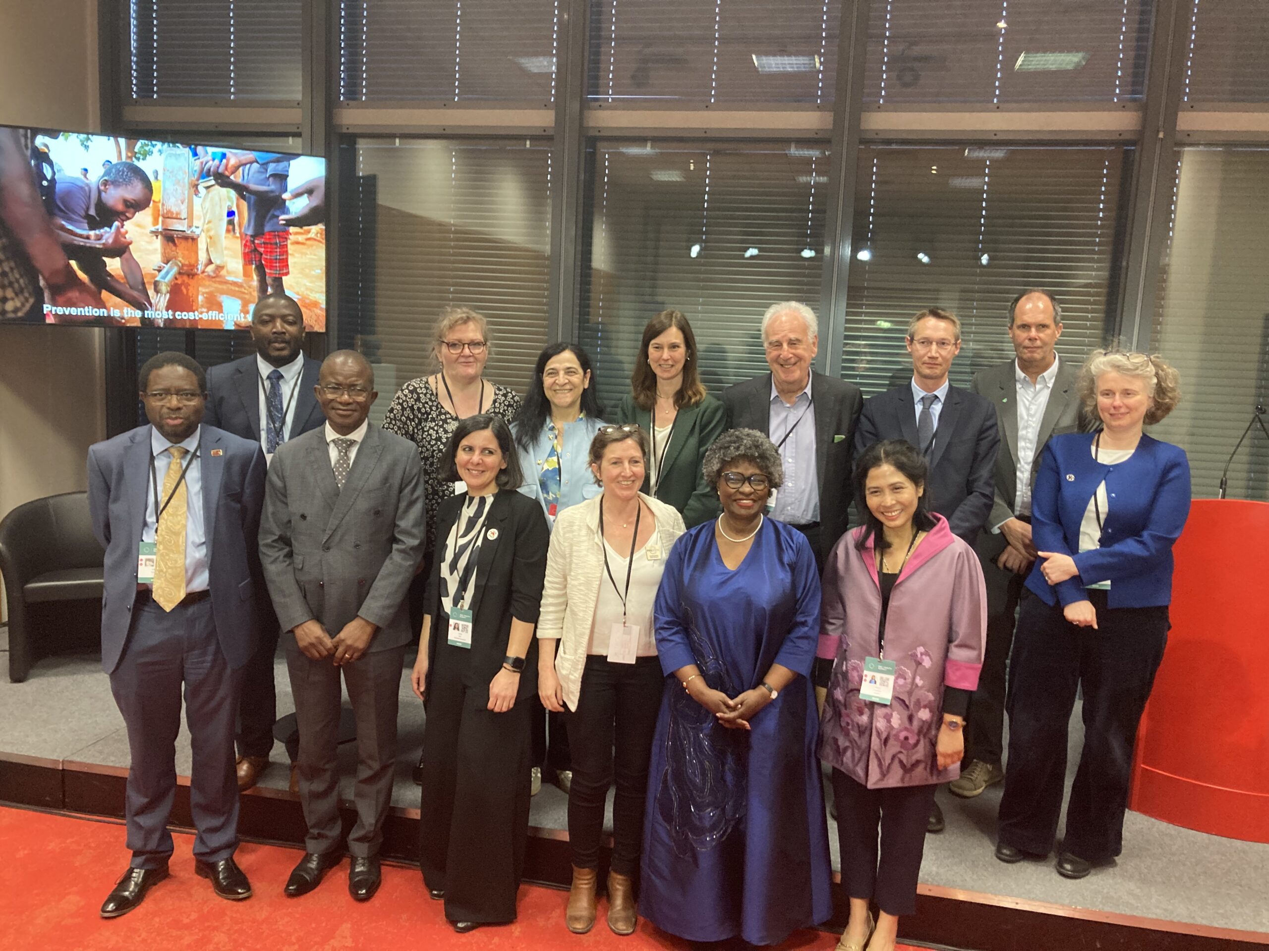group photo of the speakers at the side event on pandemics at the source: